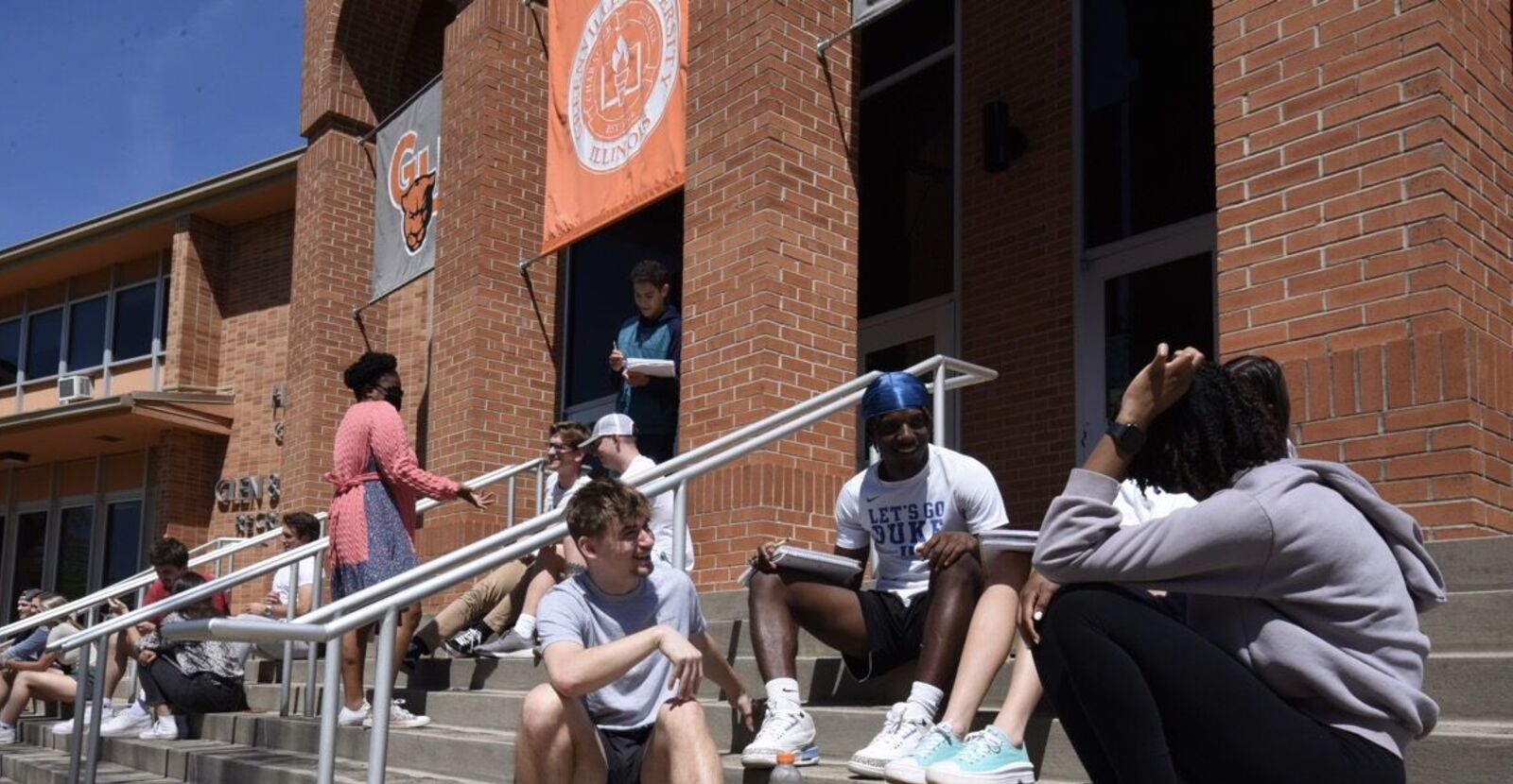 Students Sitting on Steps