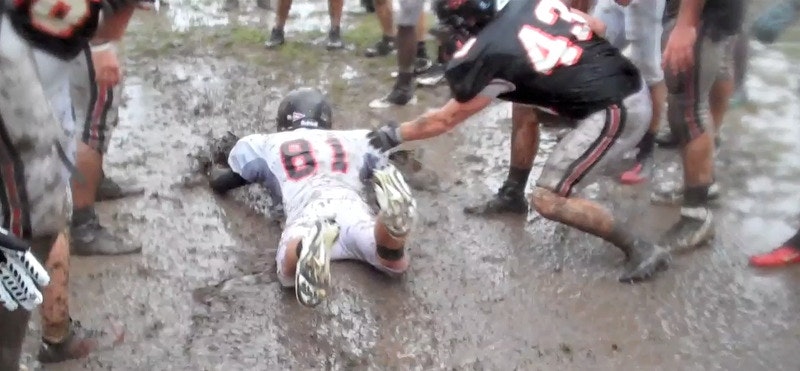 football-practices-the-mud-slide