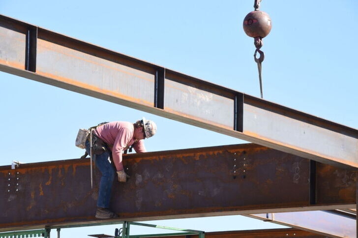 Worker on a steel rafter